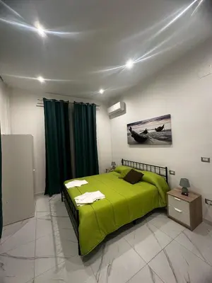Letto o letti in una camera di M2 APARTMENT