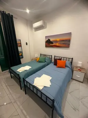 Letto o letti in una camera di M2 APARTMENT
