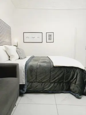 Letto o letti in una camera di Marinella House Napoli centro Piazza Dante