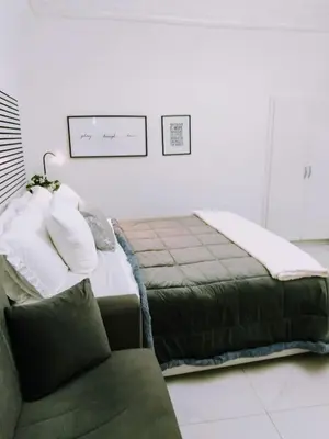 Letto o letti in una camera di Marinella House Napoli centro Piazza Dante