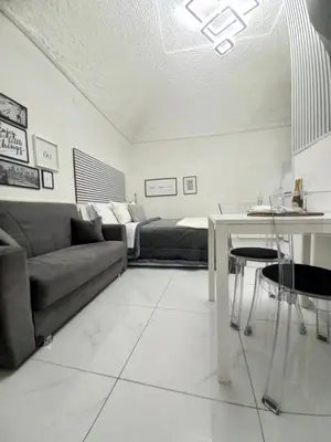 Area soggiorno di Marinella House Napoli centro Piazza Dante