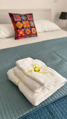 Letto o letti in una camera di DIEGO HOUSE DUOMO Costa