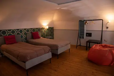 Letto o letti in una camera di Home & more Brigida