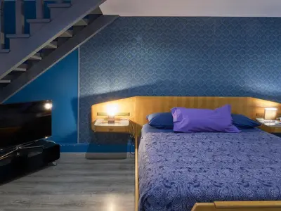 Letto o letti in una camera di Home & more Brigida