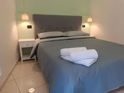 Letto o letti in una camera di Residenza GeRi - Suite and Home Napoli Centro