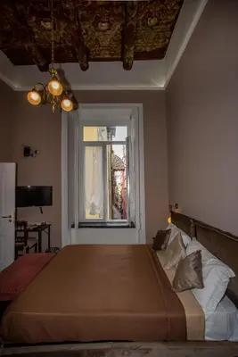 Letto o letti in una camera di Xenia Neapolis