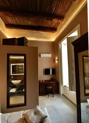 Letto o letti in una camera di Xenia Neapolis
