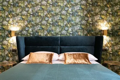 Letto o letti in una camera di Jungle Boutique