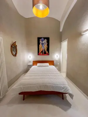 Letto o letti in una camera di Bed & Breakfast SpaccaNapoli 56