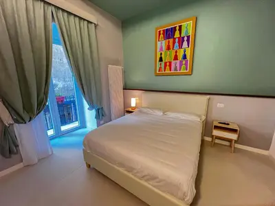 Letto o letti in una camera di Bed & Breakfast SpaccaNapoli 56