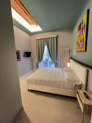 Letto o letti in una camera di Bed & Breakfast SpaccaNapoli 56