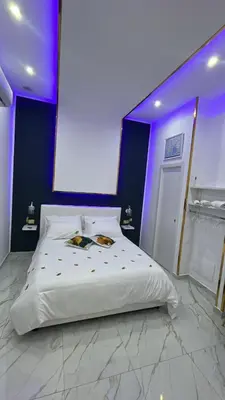Letto o letti in una camera di Regina House