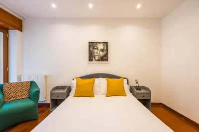 Letto o letti in una camera di Colonna Classic Style Apartment by Wonderful Italy