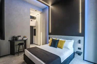 Letto o letti in una camera di Gallery Experience Napoli