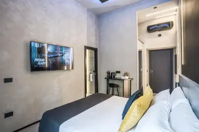 Letto o letti in una camera di Gallery Experience Napoli