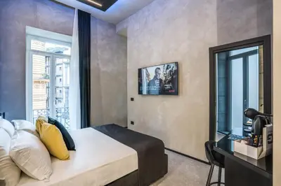 Letto o letti in una camera di Gallery Experience Napoli
