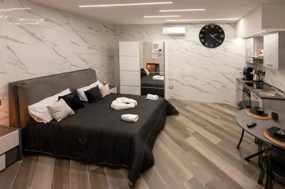 Letto o letti in una camera di Fermata San Gennaro
