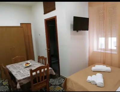 Letto o letti in una camera di Vanna Home