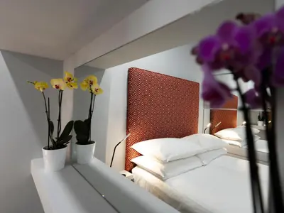 Letto o letti in una camera di Casa Vacanze Bracco 45