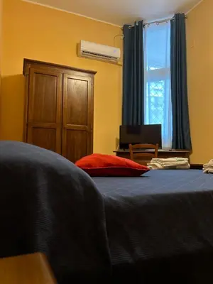 Letto o letti in una camera di SLEEPIN Montesanto