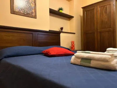 Letto o letti in una camera di SLEEPIN Montesanto