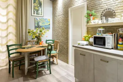 Cucina o angolo cottura di CASABARINA live in the Center of Naples