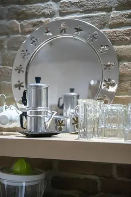 Cucina o angolo cottura di CASABARINA live in the Center of Naples