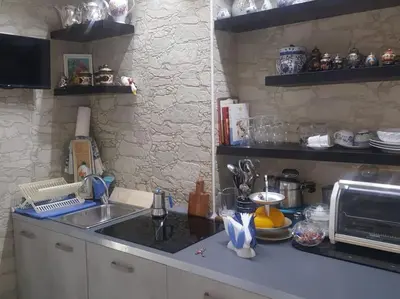 Cucina o angolo cottura di SOFIA HOUSE living in the heart of Naples
