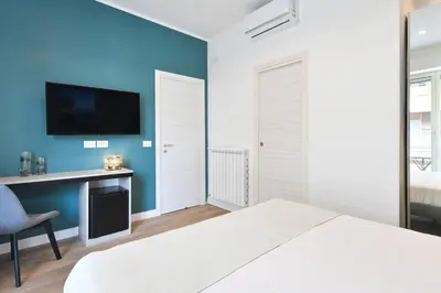 Letto o letti in una camera di Ponte di Tappia Suites