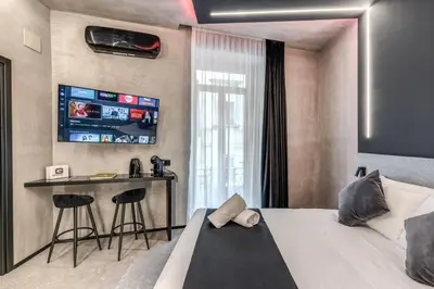 Letto o letti in una camera di Gallery Home