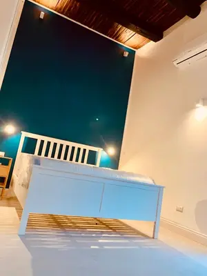 Letto o letti in una camera di Fafà Apartment City center