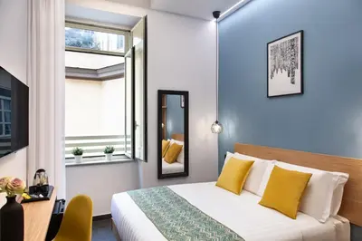 Letto o letti in una camera di MAIN - Duomo