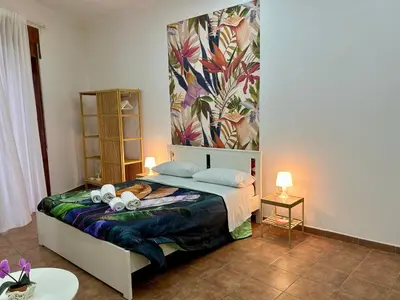 Letto o letti in una camera di MAISON PALU'