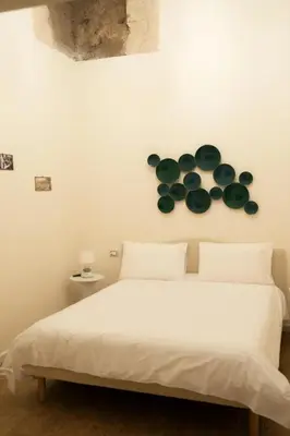 Letto o letti in una camera di Le Casine di Spaccanapoli
