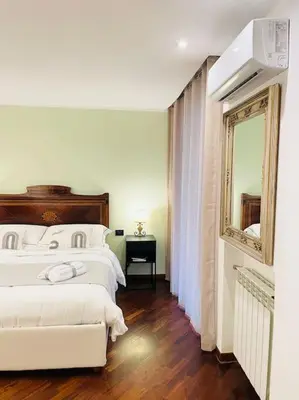 Letto o letti in una camera di Re Gallo Luxury apartment Plebiscito in Via Chiaia