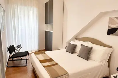 Letto o letti in una camera di Loft Metro Mergellina - Posizione strategica per visitare Napoli