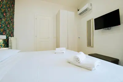 Letto o letti in una camera di Panoramic centre in Naples