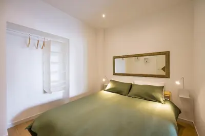 Letto o letti in una camera di Corte Belvedere