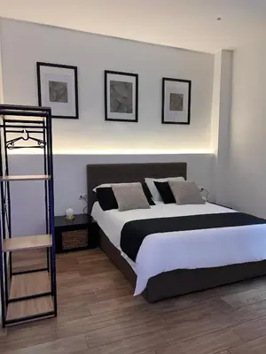 Letto o letti in una camera di Astorya e’ Napoli