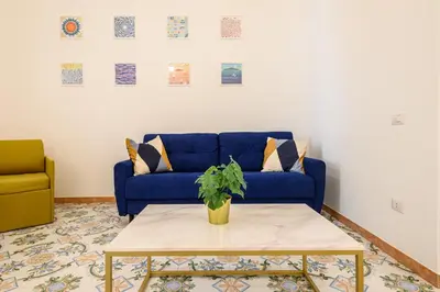 Area soggiorno di Guest House 121 Charming Apartment