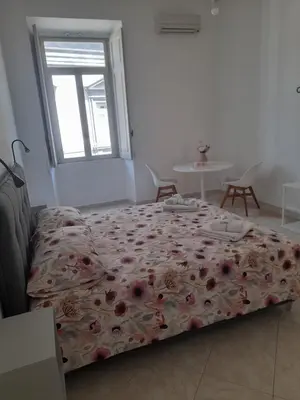 Letto o letti in una camera di Anima partenopea