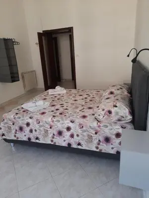 Letto o letti in una camera di Anima partenopea