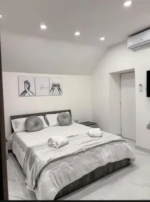 Letto o letti in una camera di Liberato Home