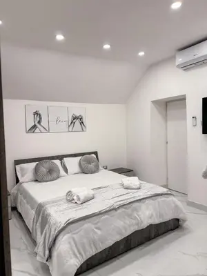 Letto o letti in una camera di Liberato Home