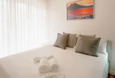 Letto o letti in una camera di B&B Interno 5