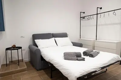 Letto o letti in una camera di Dimora Trecuori