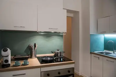 Cucina o angolo cottura di La casa di Nelly Boutique Apartment Napoli