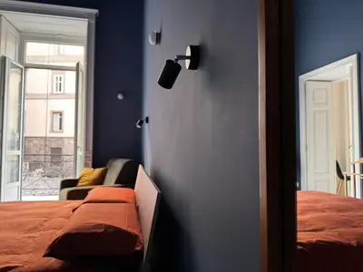 Letto o letti in una camera di Filomena Suites
