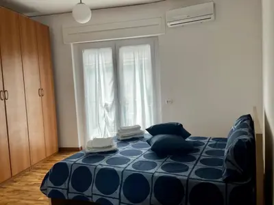 Letto o letti in una camera di Mergellina Ludopà