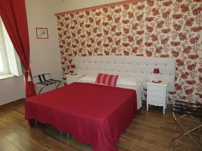 Letto o letti in una camera di Bed and Breakfast Speranzella